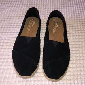 Tom’s black suede slip ons size 7